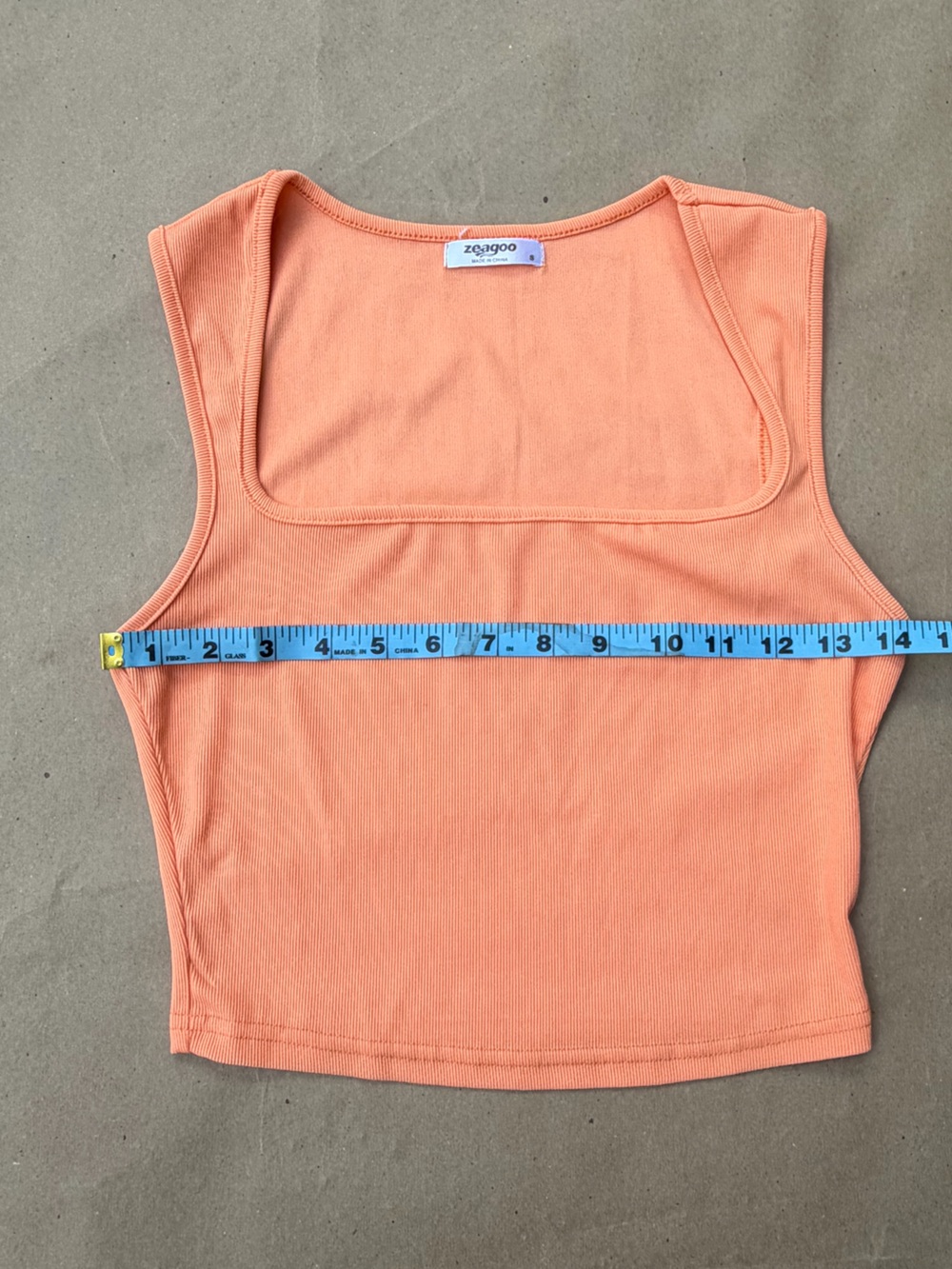 Perfect creamsicle 🍊 ribbed cropped top with a y2k square neck style. Very cute.